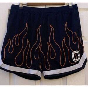 Overtime Black basketball shorts with orange flame graphics & white logo size M